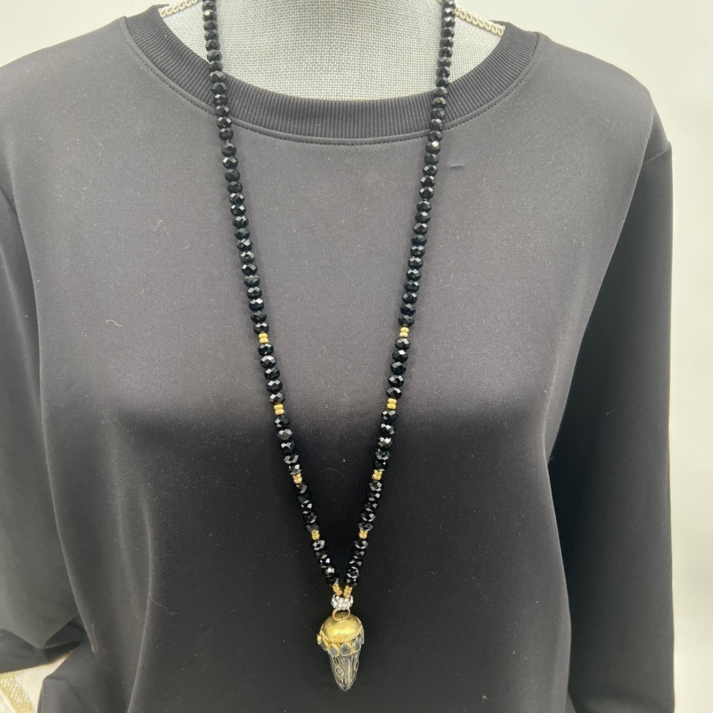 Fabulina Designs Black beads and arrowhead shape pendent.